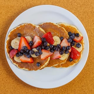 Pancakes with Strawberries, Blueberries and Bananas